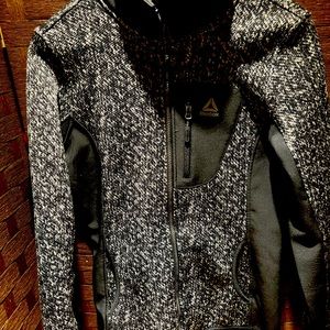 Adidas’s warm up sweater